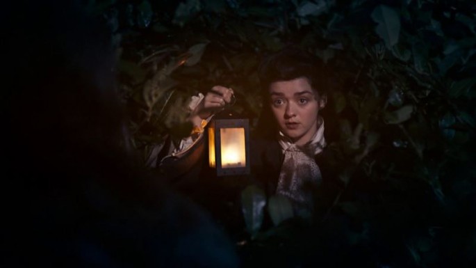Massie Williams as Lady Me holding a lantern in the recent episode of "Doctor Who" titled, "The Woman Who Lived."