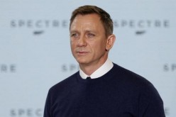 Actor Daniel Craig poses on stage during an event to mark the start of production for the new James Bond film 'Spectre' 