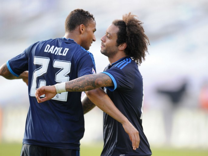 Real Madrid's Marcelo (L) and Danilo.