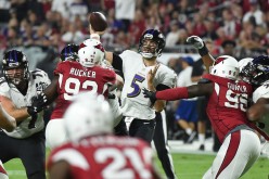 Baltimore Ravens quarterback Joe Flacco (#5) throws against the Arizona Cardinals.