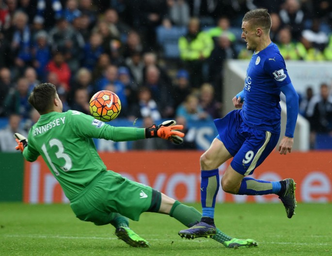 Leicester City striker Jamie Vardy scores against Crystal Palace goalkeeper Wayne Hennessey.