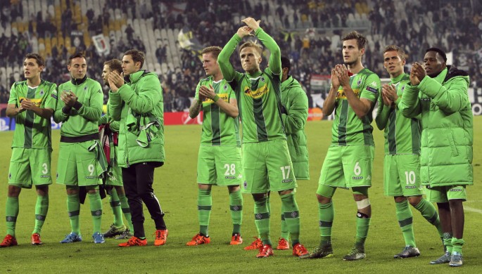 Borussia Monchengladbach players salute the fans after their goalless draw with Juventus in a recent UEFA Champions League match.