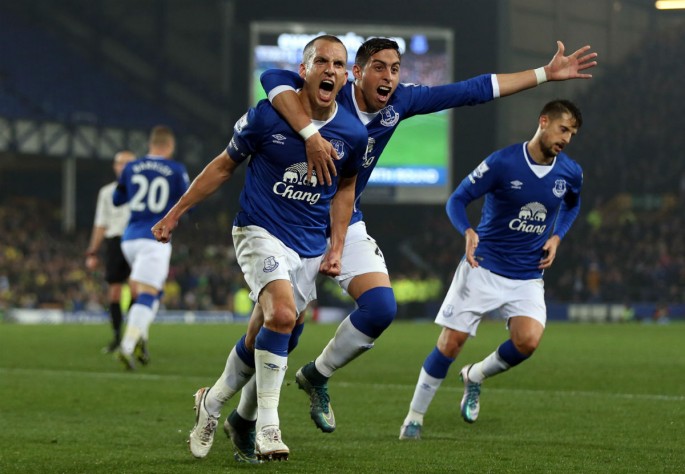 Everton midfielder Leon Osman celebrates a goal with teammate Ramiro Funes Mori.