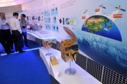 A model of China's Beidou Navigation System terminal is on display at Xinjiang International Exhibition Center in July. 