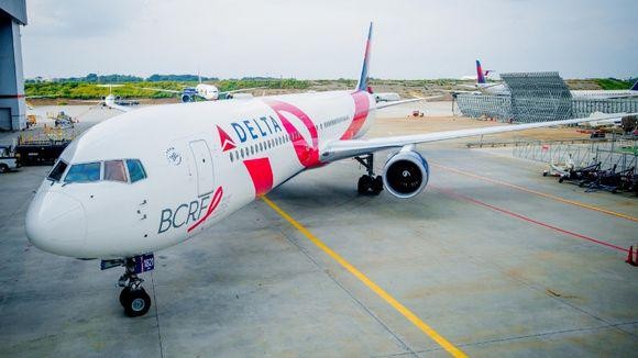 Delta Plane with NBCAM Pink Ribbon