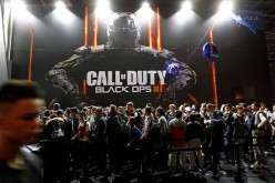  Visitors wait to play the video game 'Call of Duty : Black Ops III' developed by Treyarch at Paris Games Week, a trade fair for video games on October 29, 2015 in Paris, France. 