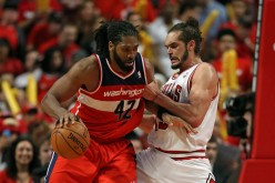 Washington Wizards Nene (L) and Chicago Bulls' Joakim Noah.