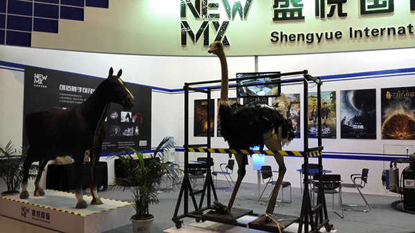 The booth of Newmax Workshop at the 10th China (Beijing) International Culture and Creative Industry Expo (ICCIE) shows a horse and an ostrich used in films.