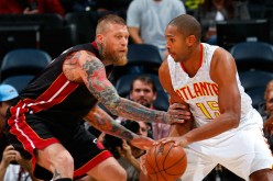 Miami Heat's Chris Andersen (L)  defends against Atlanta Hawks' Al Horford in one of the team's recent preseason games.