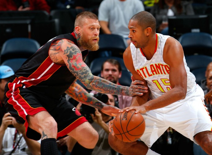Miami Heat's Chris Andersen (L)  defends against Atlanta Hawks' Al Horford in one of the team's recent preseason games.