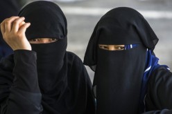 Windows of the soul: Only the eyes and some skin are made visible by the burqa, also called paranja or chadri, worn by these women.