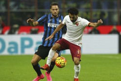 Roma winger Mohamed Salah (R) competes for the ball against Inter Milan's Danilo Ambrosio.