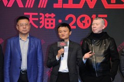  Feng Xiaogang (left) and Alibaba Group Chairman Jack Ma (center) attend a press conference for 