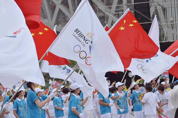 People celebrate at Olympic Plaza as Beijing wins the bidding for the 2022 Olympic Winter Games on July 31, 2015.