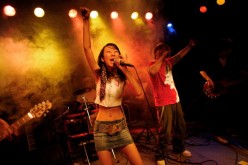 A band performs in a club at Beijing's Sanlitun night club district in Beijing, China, on Aug. 14, 2008.