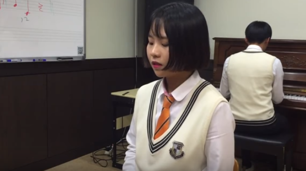 A teenage girl from Seoul, South Korea, performs Adele's "Hello" wearing her high school uniform.