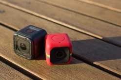 GoPro Hero 4 Session sits beside a Polaroid Cube in stark similarity.