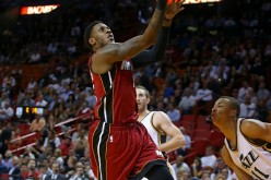 Former Miami Heat point guard Mario Chalmers goes for a layup against the Utah Jazz in this file photo.