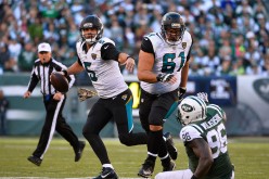 Jacksonville Jaguars quarterback Blake Bortles (#5) scrambles out of the pocket against the New York Jets.