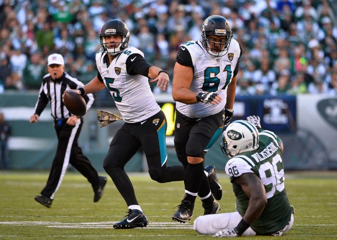 Jacksonville Jaguars quarterback Blake Bortles (#5) scrambles out of the pocket against the New York Jets.