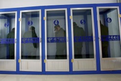 New recruits make phone calls at a military training base in Xining, Qinghai Province, China, on Jan. 13, 2007.