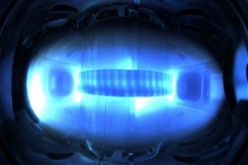 Magnetically confined plasma in the Korean superconducting tokamak, KSTAR. The extreme temperature plasma radiates in a spectrum that our eyes can not see. What is visible in this image are the colder regions on the outer edge of the plasma.