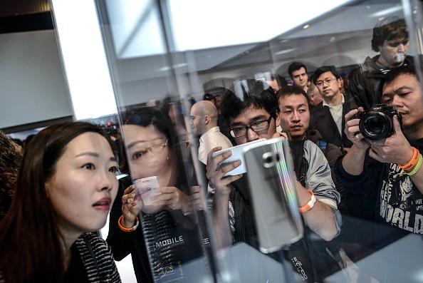Visitors and journalists take pictures of the new Samsung Galaxy S6 during the Mobile World Congress 2015 March 1, 2015 in Barcelona, Spain. 