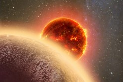 In this artist's rendering of GJ 1132b, a rocky exoplanet very similar to Earth in size and mass, circles a red dwarf star. 