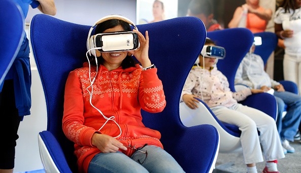  Fans attend Team USA's Virtual Reality Experience Powered by Samsung Gear VR during the 2015 Road to Rio Tour at the Head of the Charles Regatta on October 17, 2015 in Boston, Massachusetts. 
