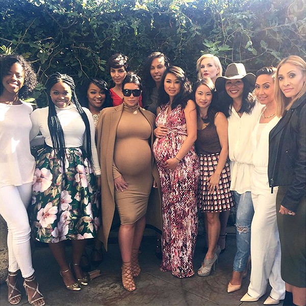 Kim Kardashian (third from left) has admitedly gained excessive weight during her second pregnancy.