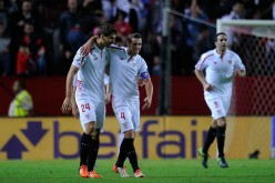Fernando Llorente and Grzegorz Krychowiak of Sevilla celebrate their recent La Liga win versus Real Madrid.