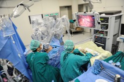 Surgeons operate a surgical robot at the First Affiliated Hospital of Sun Yat-sen University in Guangzhou, Guangdong Province, in this April 15, 2015 photo.
