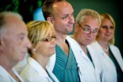 Professor Mats Brannstrom (C), head of a medical team which performed its first uterus transplant on a patient, attends a news conference