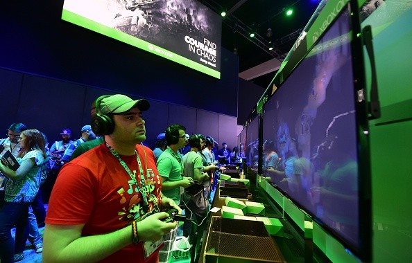 Gaming fans play Below from Xbox One at E3 - the Electronic Entertainment Expo - an annual video game conference and show at the Los Angeles Convention Center on June 16, 2015 in Los Angeles, California. 