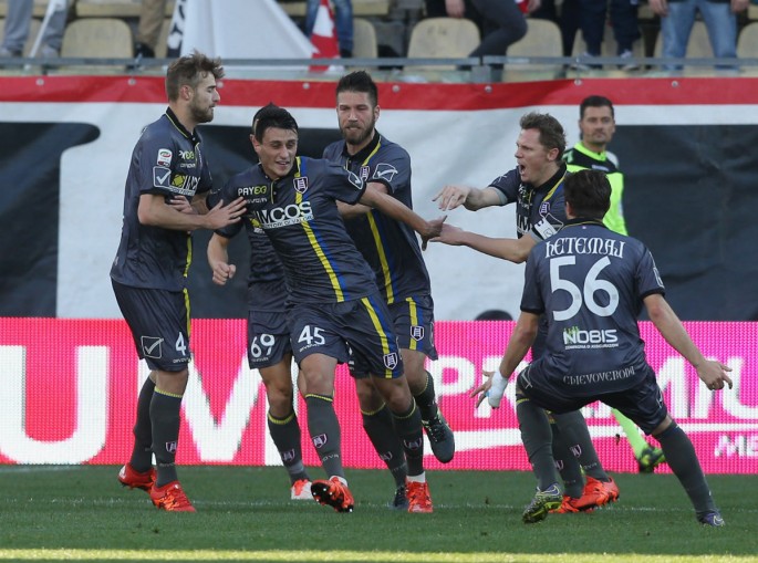 Chievo striker Roberto Inglese (#45) celebrates his opening goal against Carpi with teammates.