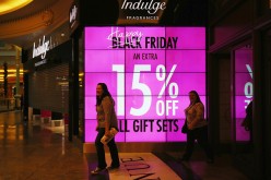 Shoppers arrive at The Trafford Centre, and wait for the shops to open in the hope of a 'Black Friday' bargain on November 27, 2015 in Manchester, United Kingdom.