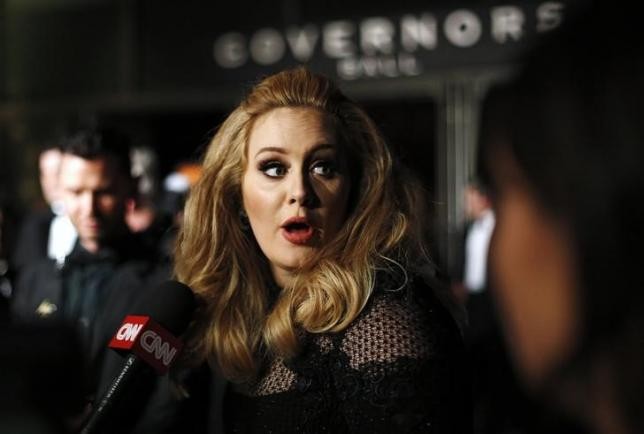 British singer Adele is interviewed at the Governors Ball following the 85th Academy Awards in Hollywood