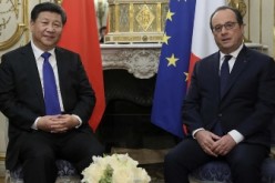 President Xi Jinping meets with French President Francois Hollande for the much-awaited United Nations Conference on Climate Change in Paris.