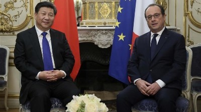 President Xi Jinping meets with French President Francois Hollande for the much-awaited United Nations Conference on Climate Change in Paris.