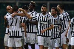 Juventus players celebrate midfielder Stefano Sturaro's (#27) goal against Palermo.