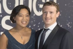 Facebook CEO Mark Zuckerberg poses with wife Priscilla Chan.