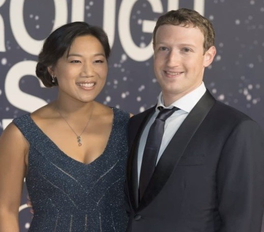 Facebook CEO Mark Zuckerberg poses with wife Priscilla Chan.