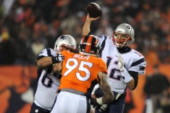 New England Patriots quarterback Tom Brady (#12).