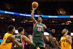 Milwaukee Bucks shooting guard O.J. Mayo (#00) shoots over the Cleveland Cavaliers in a recent regular season game.