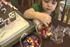 A kid takes multicolored candies, unaware of the dangers of artificial dyes poured in such foodstuff.