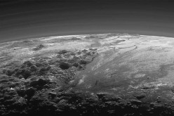 A close-up view of the rugged, icy mountains and flat ice plains on Pluto is seen in an image from NASA's New Horizons spacecraft taken July 14, 2015 and released Sept. 17, 2015.