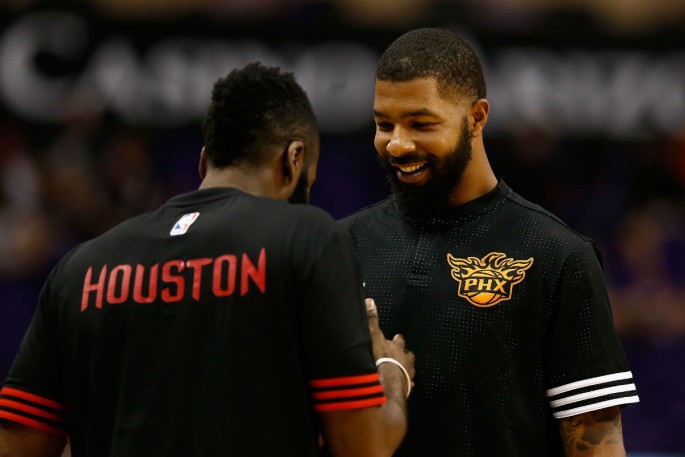 Phoenix Suns power forward Markieff Morris (R) is welcomed by Houston Rockets' James Harden during their preseason game. The Rockets are rumored to be interested in trading for Morris this midseason.