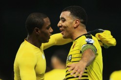 Watford's Odion Ighalo (L) and Troy Deeney.