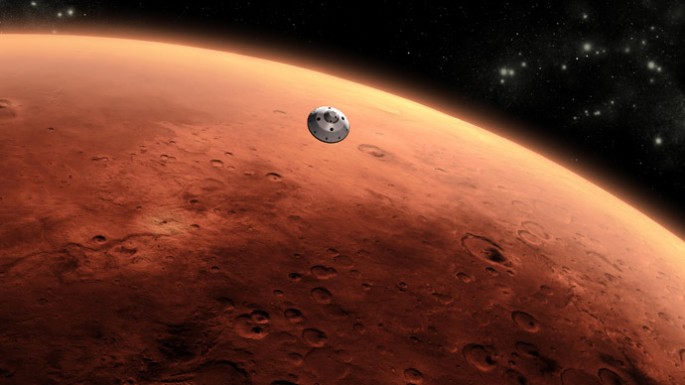 An artist's perspective of a spacecraft reaching Mars as a manned mission on the Red Planet