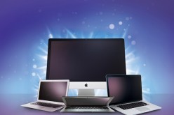 Illustration of Apple computer devices, including an iMac, MacBook and MacBook Air, created on December 8, 2014. 